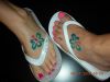 Temporary flowers tattoo on feet